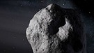Illustration des Asteroiden 3200 Phaeton. Der rund 5 Kilometer im Durchmesser große Asteroid stellt Forscher vor ein Rätsel: Er scheint wie ein Komet Quelle der Geminiden-Sternschnuppen zu sein und hinterlässt gelegentlich eine Spur aus Gesteinsmaterial im All. Auch seine Flugbahn gleicht eher einem Kometen. Ist 3200 Phaeton ein ausgebrannter Kometenkern? | Bild: NASA/JPL-Caltech