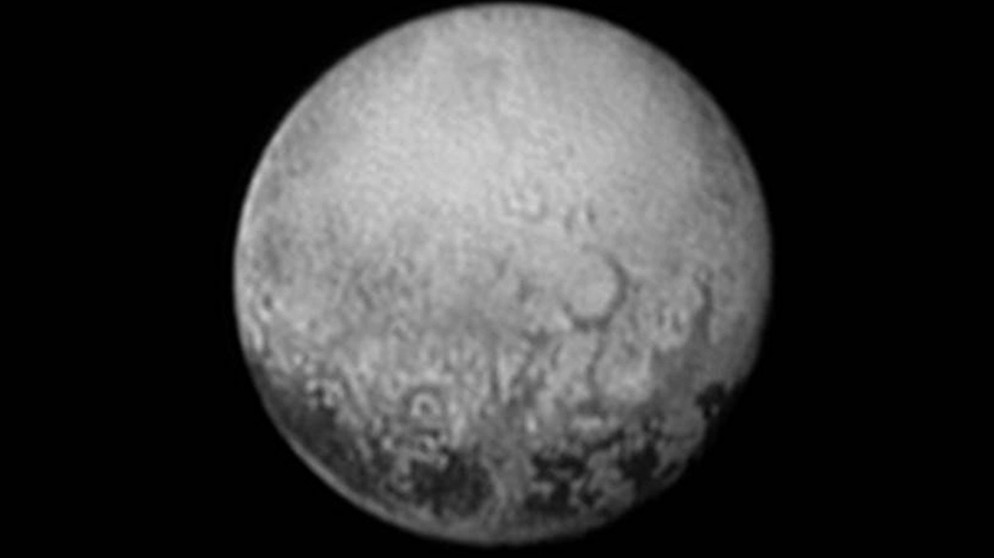 Pluto mit vier dunklen Punkten | Bild: NASA/JHUAPL/SWRI