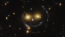 Weltraumteleskop Hubble hat ein "Smiley" aufgenommen. | Bild: ESA/ NASA