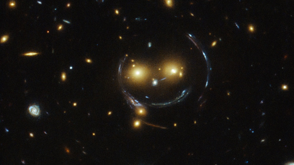 Weltraumteleskop Hubble hat ein "Smiley" aufgenommen. | Bild: ESA/ NASA